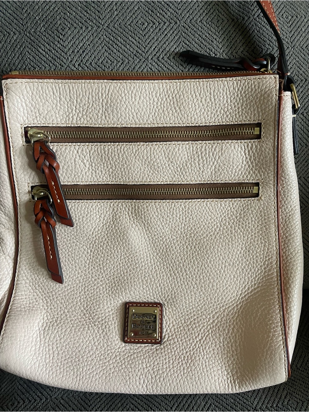 Dooney & Bourke Cream Leather Messenger Bag with Brown Trim